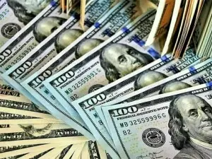 Rupee registers gain against US dollar