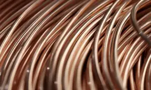 Copper hits near two-week high, aluminium hovers around four-year peak