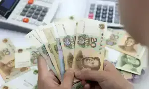 Yuan eases from 3-year peak as factory activity stalls