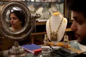 Gold set for weekly loss on inflation, rate hike fears Gold set for weekly loss on inflation, rate hike fears