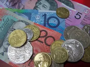 Australian dollar dips, RBA delivers hawkish hold