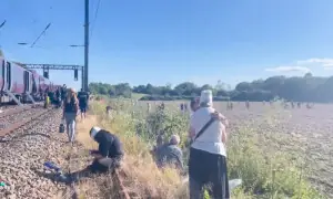 Driver killed, 28 in hospital as UK train collision probed