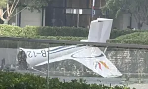 Beijing investigating rare light aircraft crash which killed pilot, injured 13