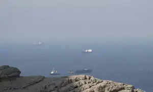Iran says new Hormuz route agreed with Oman