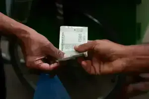 Indian rupee ends nearly flat as traders remain glued to oil moves, RBI caps fall