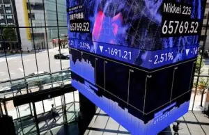 Asian shares fall after wild swings in bonds, FX before US jobs data