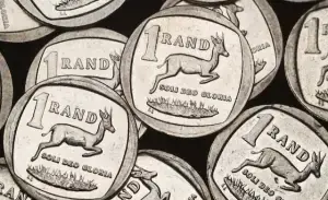 South African rand holds firm despite stronger dollar and weak metals