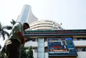 Indian shares on track for muted open as oil prices, foreign outflows weigh