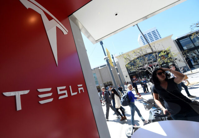 Tesla tops quarterly sales forecast