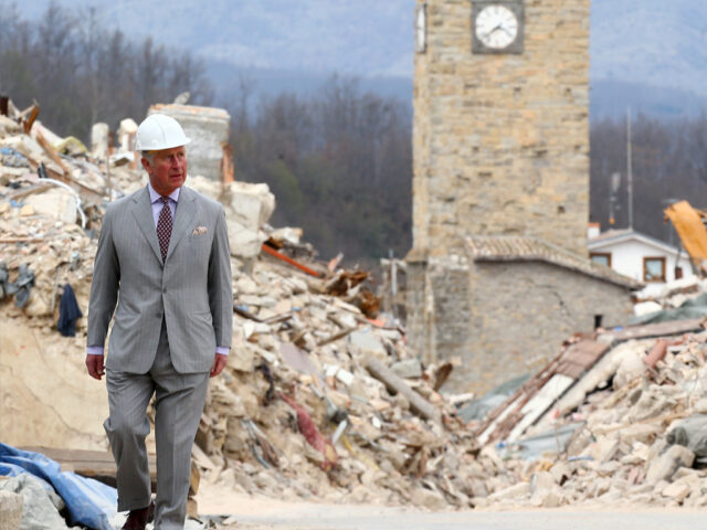 Prince Charles embraces Italy quake survivors