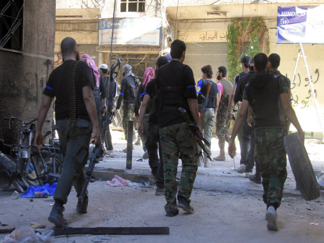Syria rebels tell fighters to 'ignite fronts' to avenge gas attack