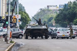 UK urges restraint in Zimbabwe, voices cautious hope