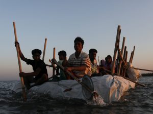 Refugees boat in Naf River