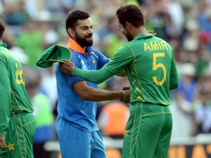 India's Kohli topples Amir, Sarfraz in Pakistan