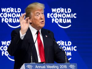 Trump woos Davos with pacific trade deal shift