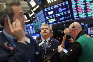 Dow hits record on Intel earnings