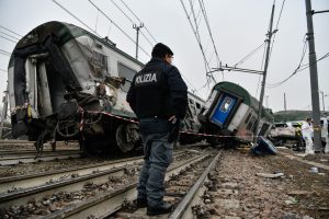 Three dead as packed commuter train derails in Italy