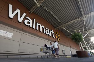 Walmart raises US worker pay following tax cut