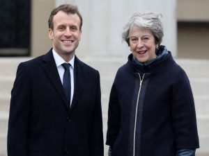 May, Macron strike border security deal at UK summit