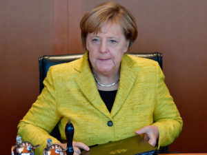 Merkel's fate in SPD hands as members vote on power pact