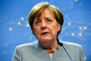 Merkel quells party rebellion ahead of coalition deal vote