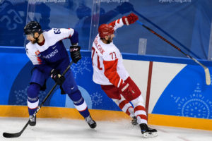 Russians shut out US men, claim group lead