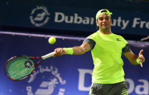 Top seed Dimitrov stunned by Jaziri in Dubai