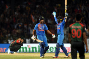 Karthik's last-ball six gifts India T20 tri-series title
