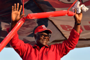Sierra Leone leader defends presidential candidate, record