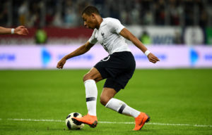 Mbappe shines as France cruise past Russia
