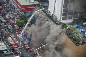 Four killed, 19 trapped in Philippine hotel fire