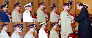 President confers military awards on Pakistan Day