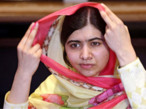 Malala arrives at her hometown in Swat amid tight security