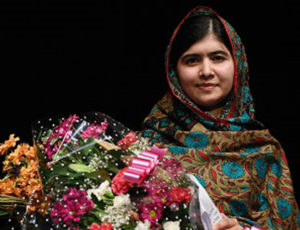 Malala gives tearful speech on her return home