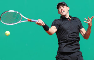 Thiem saves match point in victory over Rublev