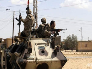 Egypt army says 8 soldiers, 14 militants killed in Sinai attack