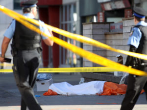 Van plows into Toronto crowd in 'deliberate' act, leaving 10 dead