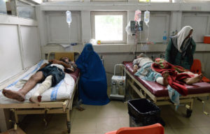 At least ten dead after bomb, gun battle in Afghan city