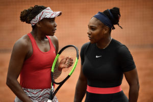 Williams sisters dumped out of French Open doubles