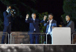 Turkey's Erdogan claims election victory, opposition wary
