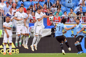 Uruguay top World Cup group as Spain, Portugal target knockouts