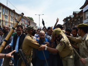 Dozen injured as Indian troops use force against mourners