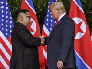 Trump, Kim share historic handshake