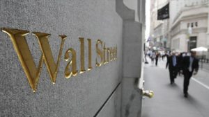 Dips in Facebook and Apple leave Wall Street lower